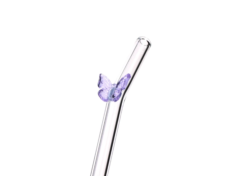 Kpl. 6 szklanych słomek z ozdobną dekoracją i czyścikiem.